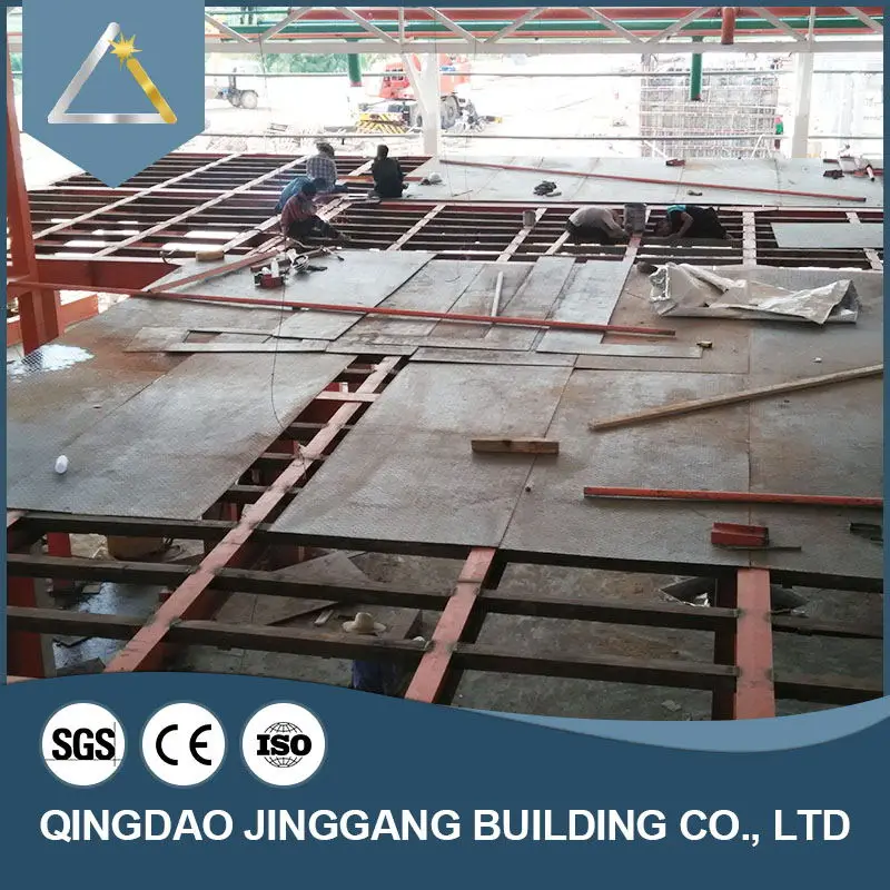 Prefab Customized Steel Structure Economical Quonset Hut Prefabricated Steel Structure Warehouse Q345 Q235 Jinggang Shutter Door